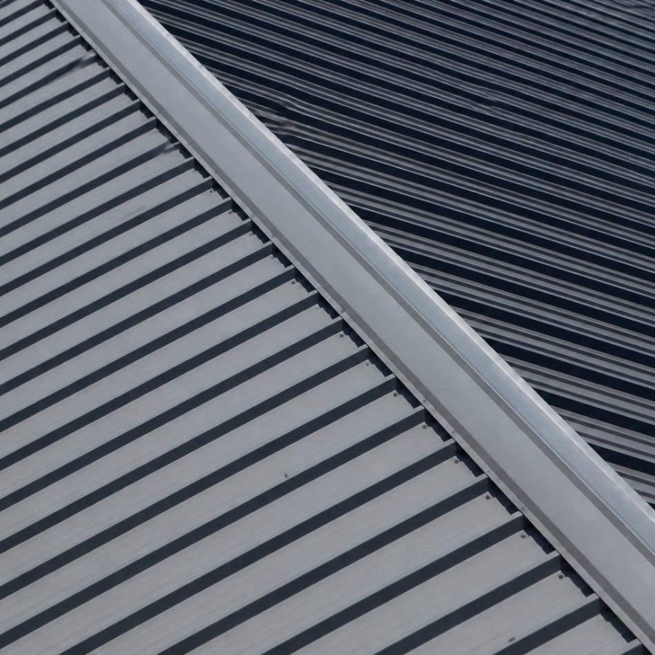 close up of grey trapezoidal Colorbond commercial roof panels